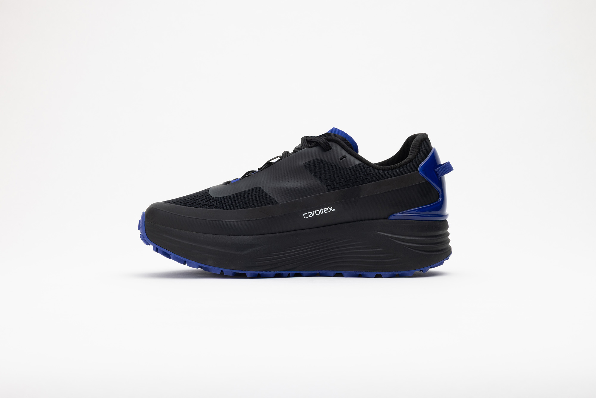 Black PSGEN3 sneaker from its inner side, showing the Carbitex badge.