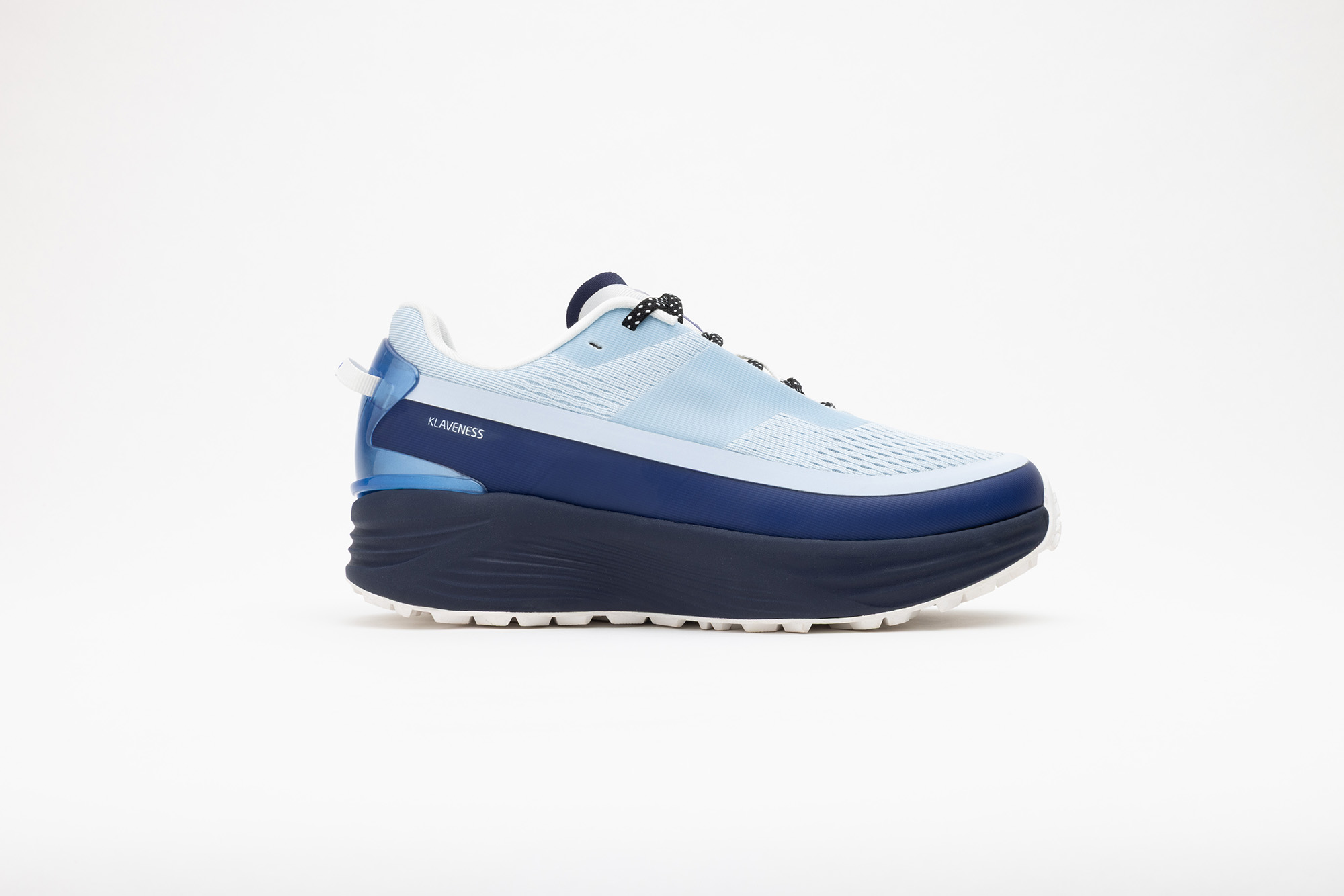 Pale blue PSGEN3 sneaker in profile, on a navy midsole.