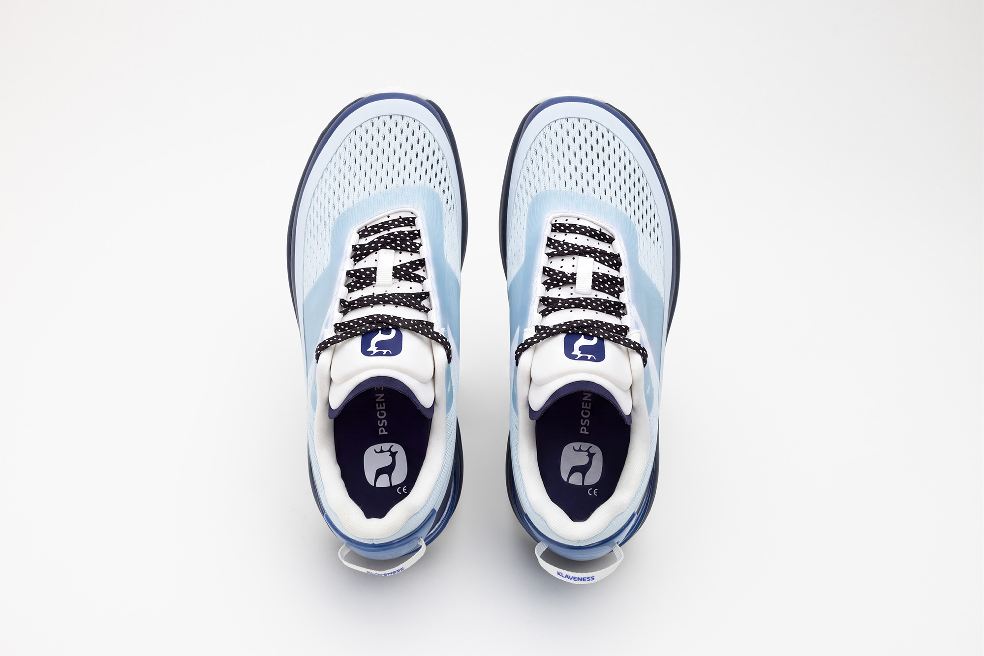 A pair of pale blue PSGEN3 sneakers seen from directly above.